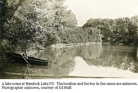 hcl_lake_scene_hemlock_19xx_boy_in_canoe_unknown_place_pic01_resize480x275